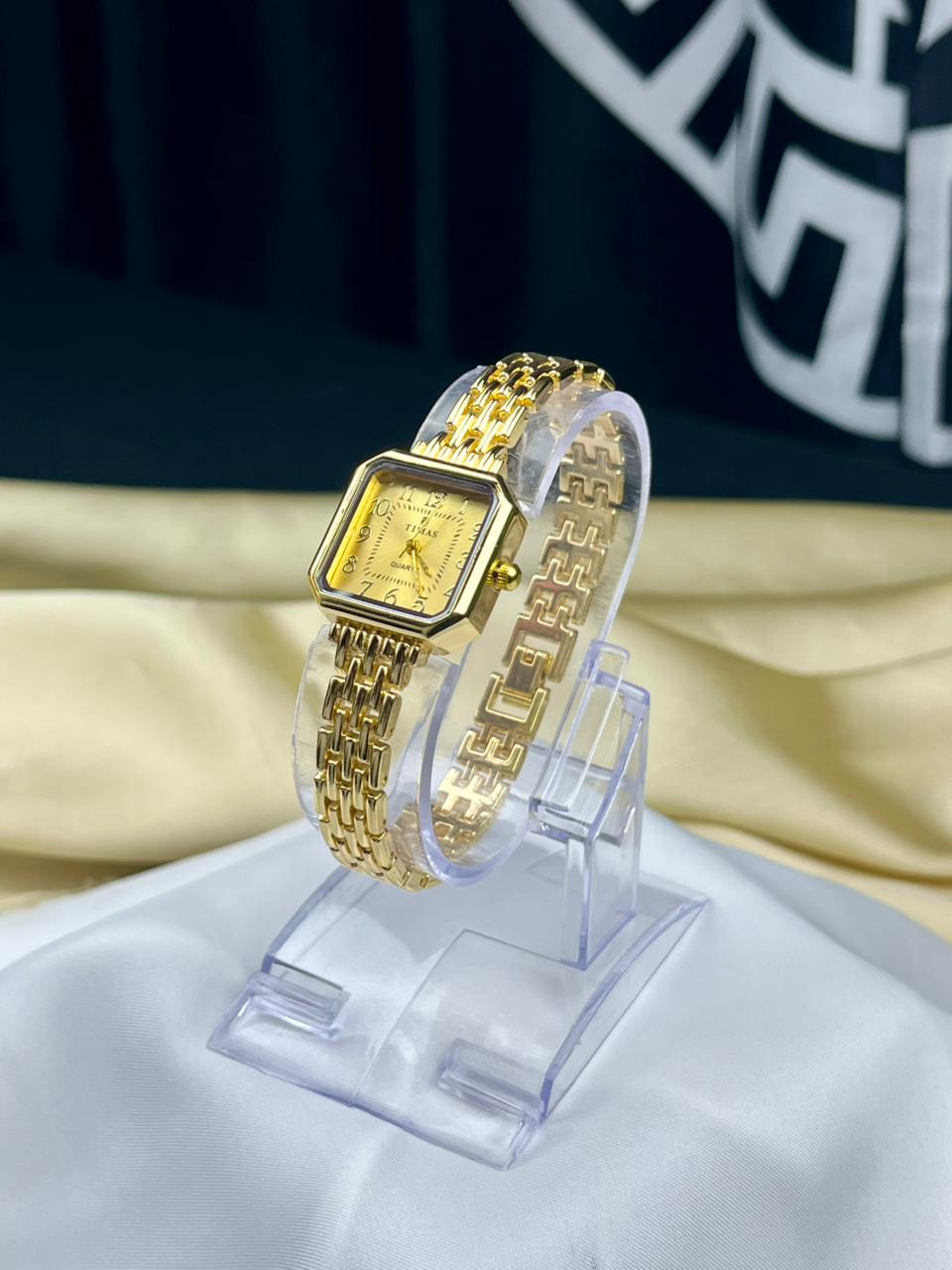 vintage style gold ladies watch with linked bracelet strap