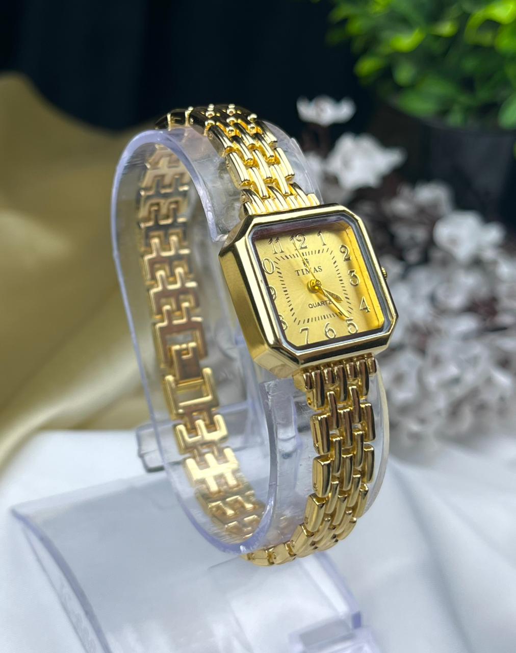 vintage style gold ladies watch with linked bracelet strap