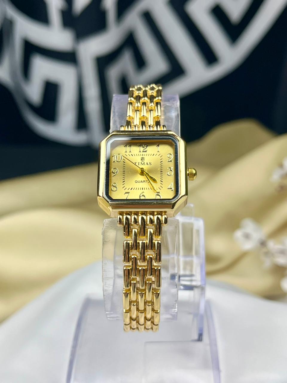 vintage style gold ladies watch with linked bracelet strap