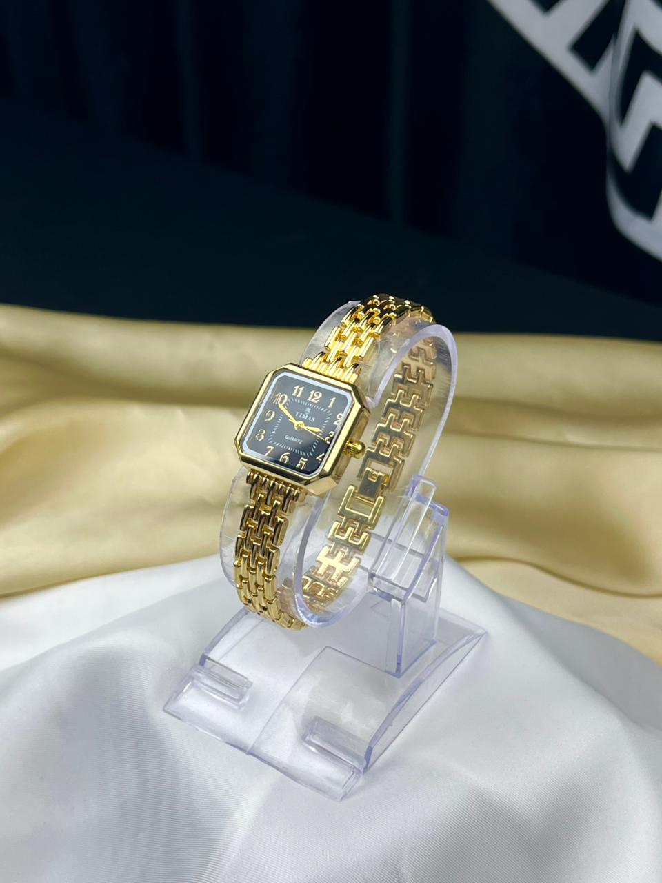 vintage style gold ladies watch with linked bracelet strap