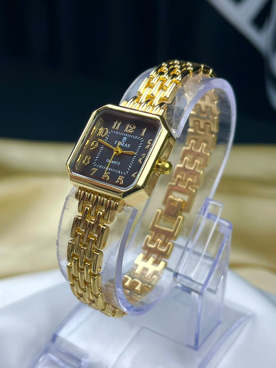 vintage style gold ladies watch with linked bracelet strap